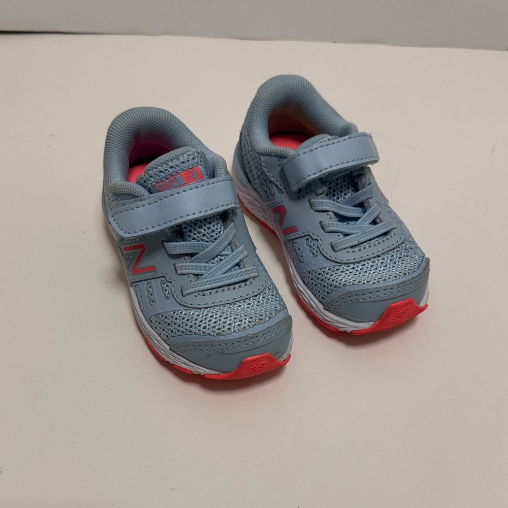 New Balance Kids Light Blue Sneakers with Pink Accents